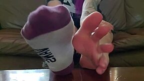 Mistress Crystal Rivers conducts a tantalizing toes and dirty talk session