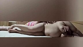 A well-endowed stud satisfies a voluptuous Asian housewife