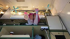 Sweet and innocent girl shows off her pink underwear at the office