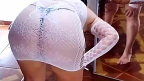 Black queen in bodysuit and thong teases with toy