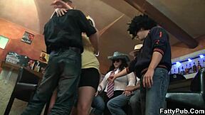 Intoxicated full-figured partygoer undressing in the pub