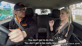 Voluptuous blonde with pigtails receives a car blowjob