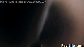 A young brunette gets penetrated by a large black penis