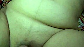 A tight Asian housewife experiences an intense orgasm