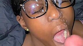 A young African American stripper engages in both oral and penetrative sex before receiving a messy facial.