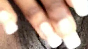 Sexy African beauty explores her own big pussy