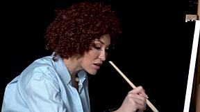 Busty mature beauty Ryan Keely cosplays as Bob Ross in a steamy painting tutorial session