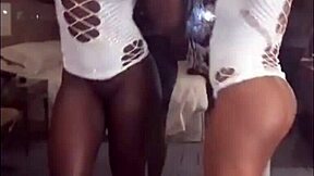 Two sultry ebony beauties ring in the new year with seductive moves and revealing their plump derrieres
