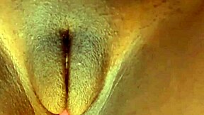 Voluptuous vixen with a big clit and a fat pussy gets muscular in this steamy video