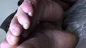 Angela's tantalizing skintight display and toe tease