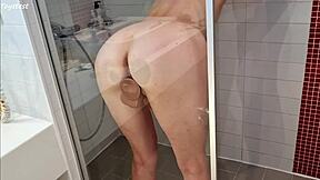 Steamy shower leads to intense dildo play for eager MILF