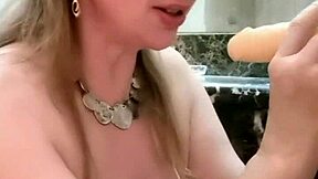 Mariaold, the busty milf strips and gives a great blow job in stockings and heels.