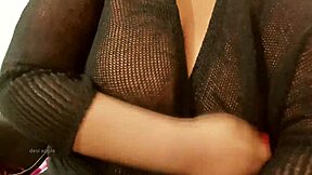Pretty Asian woman with big chest and sexy look.