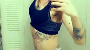 Beautiful transsexual in a mini skirt masturbates.
