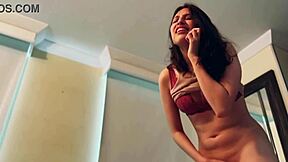 A hot girl receives a steamy call and a hotel staff member films her.