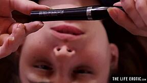 A beautiful brunette with great nipples gets pleasure from a pen in her wet vagina.
