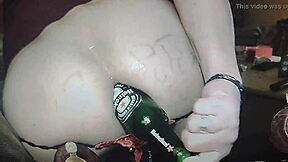 Lorenna's ass gets a good drilling with a bottle