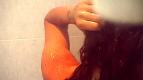 Amateur shower scene with a fetish twist: pee play with a Latina teen