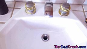 Beautiful teenage girl with blonde hair gives a sensual handjob in a very hot scene.