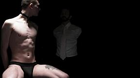 Gay bondage auction: sexy brunette boy up for sale