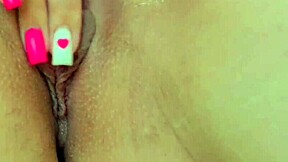 Close up of a hairless pussy getting pleasure from small fingers