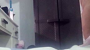 Real spy cam footage of a hot Latina in her panties