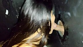 A hot wife satisfies her husband with a gloryhole threesome
