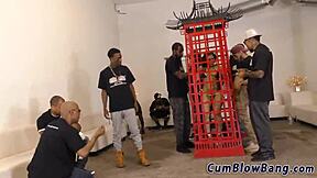 Teen girl gives blow job to big black cock while being tied up