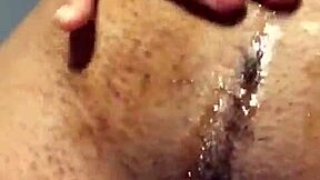Beautiful woman of color masturbating