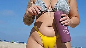 Public display of affection on the beach of the daring couple