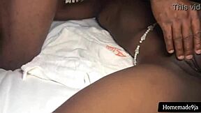 An amateur couple having sex in a missionary position