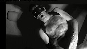 Gay erotic video with a theme of Satanism with dildo, fist and cum shot
