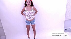 A sexy brunette teen gives a double blowjob to two big cocks during an audition