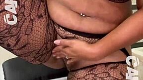 Big beautiful woman enjoying pleasure in her thick body