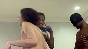 A gang bang with an interracial couple and a big black cock