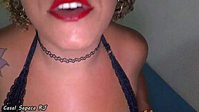 Redhead gets a lot of cum on her face in a wild handjob scene