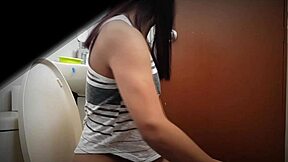 Pretty college girl from Colombia pees in this video