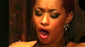 Black lesbian BDSM with oiling up and pussy licking followed by strapon sex