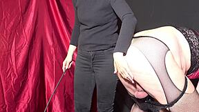 A French mistress punishes her submissive partner who wears a chastity device
