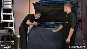 Gay mechanics have sex in the garage
