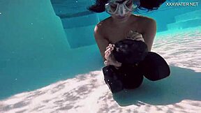 Brita piskova's solo performance in the bath tub of the jacuzzi in the pool