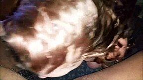 Red-haired amateur gives a POV blowjob to a big black cock