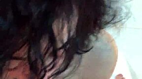 A small tattooed woman gives a blow job with the help of a POV camera