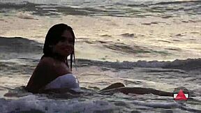Free use of fetish content with an Asian amateur in a bikini at the beach