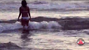 Free use of fetish content with an Asian amateur in a bikini at the beach