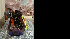 Gay spiderman in spandex masturbates on a motorcycle
