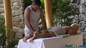 Pretty woman with great big cans gives a sensual foot massage with a happy ending