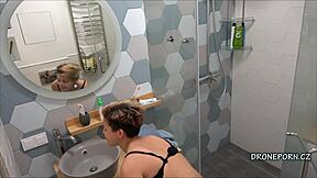 Alex caught on voyeur cam showering, unaware of the hidden lens.