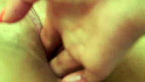 Hot European woman gets her puffy nipples teased and her vagina fingered and fisted by a lesbian couple