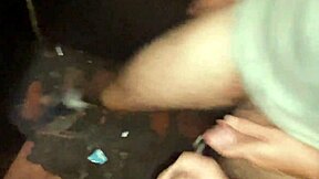 Gay men in a steamy scene in a dark room